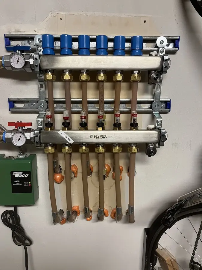 Plumber performing Leak Detection at a residential property in Milan